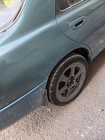 demio бампер: Mazda Cronos: 1993 г., 2 л, Автомат, Бензин, Седан — 2
