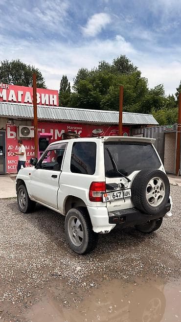 Транспорт: Mitsubishi Pajero iO: 1998 г., 1.8 л, Механика, Бензин, Внедорожник — 2