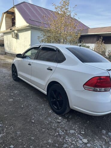 дом обмен на авто: Volkswagen Polo: 2013 г., 1.6 л, Механика, Бензиновая, Седан — 17