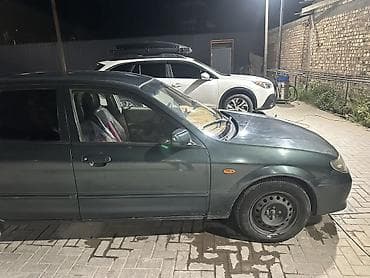 Mazda 323: 2002 г., 1.6 л, Автомат, Бензин, Хэтчбэк