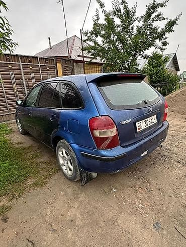 Транспорт: Mazda 323: 2001 г., 1.6 л, Кол менен иштөөчү, Бензин, Хетчбек — 3