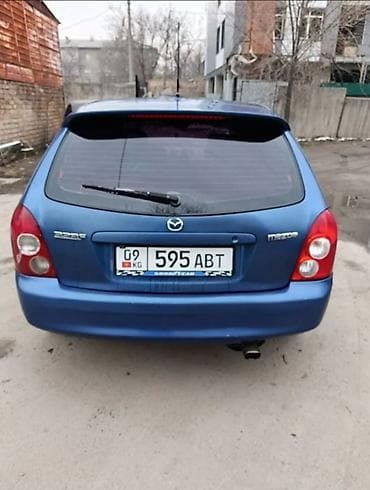 форд сиеро: Mazda 323: 2002 г., 1.6 л, Ручные, Бензин, Хэтчбэк — 4