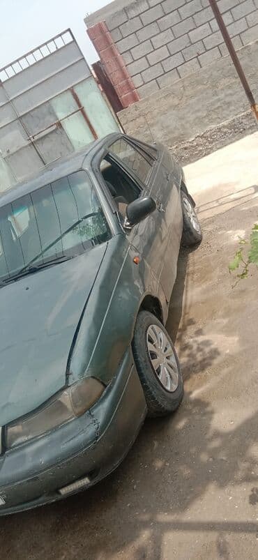 дом на колосах: Daewoo Nexia: 2004 г., 1.5 л, Механика, Бензин, Седан — 3
