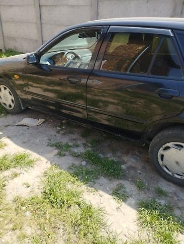 mazda 324: Mazda 323: 2002 г., 1.6 л, Механика, Бензин, Хэтчбэк — 3