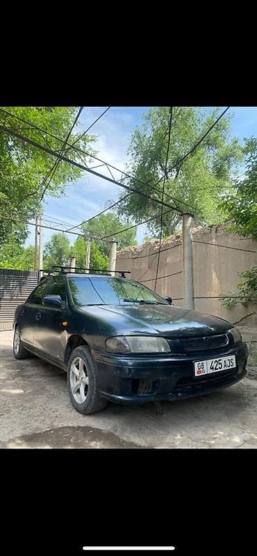 krone sd: Mazda 323: 1996 г., 1.6 л, Механика, Бензин, Седан — 6