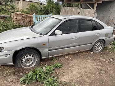салон на гольф 2: Mazda 626: 1998 г., Хэтчбэк — 2