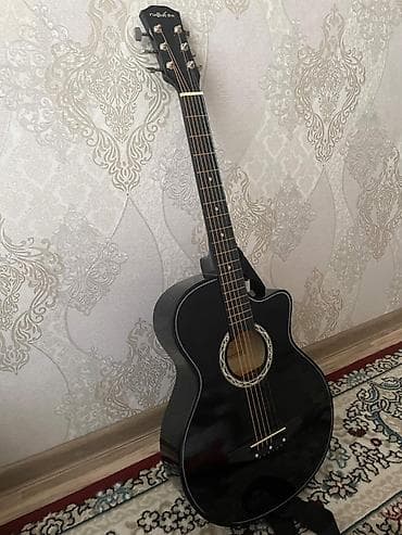 Гитара сатылат 38 размер новый кападостор есть чехол есть цена
