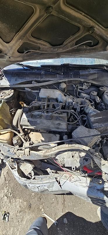 Кузовные детали: Toyota Carina универсал, серебристый, дорестайлинг (около 1996 г.) — 1