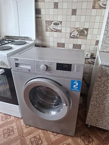 poco 71: Стиральная машина Beko, фронтальная загрузка, серебристый цвет — 1