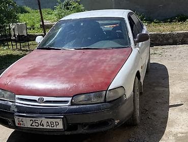 Транспорт: Mazda 626: 1992 г., 2 л, Механика, Бензин, Лифтбек — 6