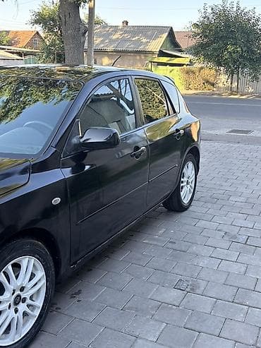 Mazda 3: 2006 г., Хэтчбэк — 2