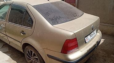 Транспорт: Volkswagen Bora: 2001 г., Бензин, Седан — 1
