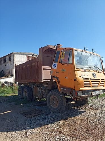 Транспорт: Самосвал CAMC (кабина с надписью STEYR), 6x4. Особенности: - Колесная — 2
