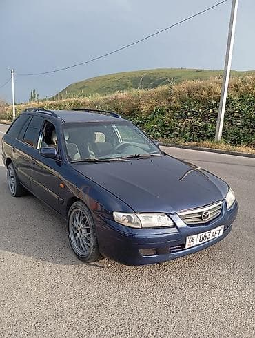 Mazda Capella: 2000 г., 0.2 л, Механика, Бензин, Универсал at lalafo.kg Mazda Capella: 2000 г., 0.2 л, Механика, Бензин, Универсал