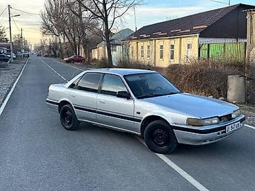 муссо истана: Mazda 626: 1990 г., Седан — 5