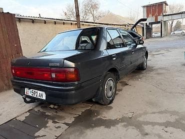 бампер мазда фамилия: Mazda 323: 1992 г., 1.6 л, Автомат, Бензин, Седан — 3