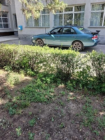 demio бампер: Mazda Cronos: 1993 г., 2 л, Автомат, Бензин, Седан — 6