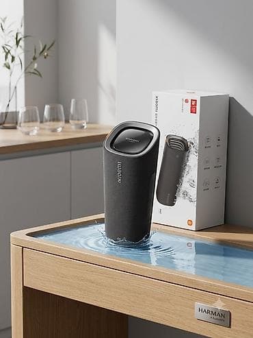 Портативная Bluetooth‑колонка Xiaomi с акустикой Harman - Мощное