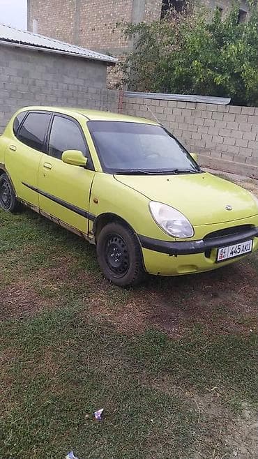 Daihatsu Storia: 1999 г., Хэтчбэк