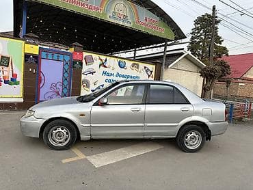 golf variant: Mazda 323: 2002 г., 1.6 л, Механика, Бензин, Седан — 3