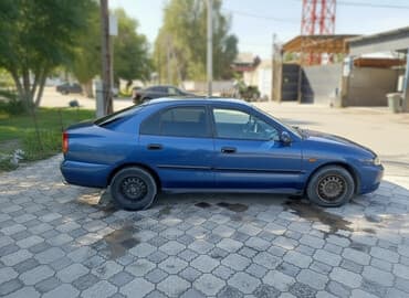 чехол на демио: Mitsubishi Carisma: 1998 г., 1.8 л, Механика, Бензин, Седан — 2