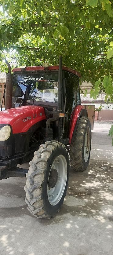 германский комбайн: Трактор Jinma LX704, колесная формула 4х4, с закрытой кабиной — 3