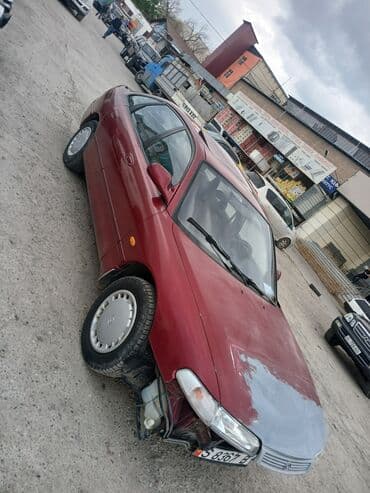 Ковролин: Mazda Cronos: 1992 г., 2 л, Механика, Бензин, Хетчбек — 1