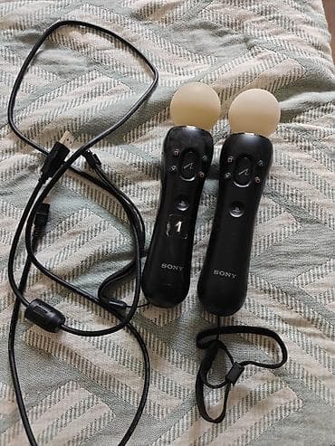 Два контроллера движения Sony PlayStation Move + USB‑кабель для