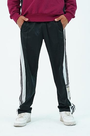 джинсы килоты: Спортивные штаны adidas с кнопками по бокам. Сэкон-Хенд — 7