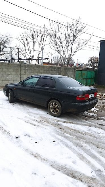 Toyota Carina E: 1997 г., 2 л, Механика, Бензин, Седан