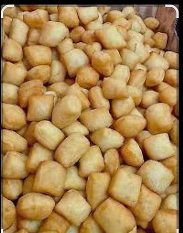 Пышки/мини-пончики во фритюре - Свежие жареные кусочки дрожжевого