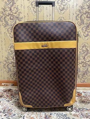 Жеке буюмдар: Чемодан, Чоң (70 л ашык, Дөңгөлөктүү — 1