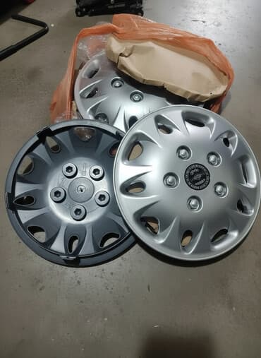 Колпаки на диски R12. Новые. Комплект( 4шт)