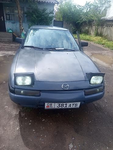 Mazda 323: 1989 г., Кол менен иштөөчү, Седан — 3