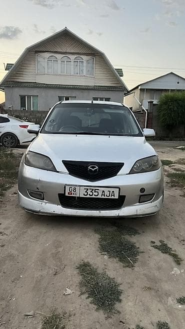 Mazda Demio: 2003 г., 1.5 л, Автомат, Бензин, Хэтчбэк — 2