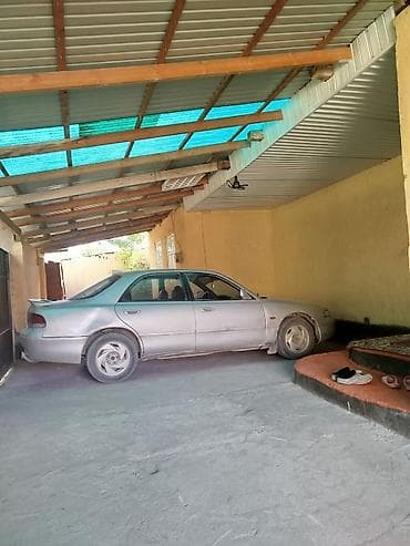 mazda демио: Mazda 626: 1993 г., Седан — 3