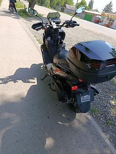 Скутерлер: Скутер/мопед 50–150 см³ класса “ADV” в черном цвете. в хорошем — 5