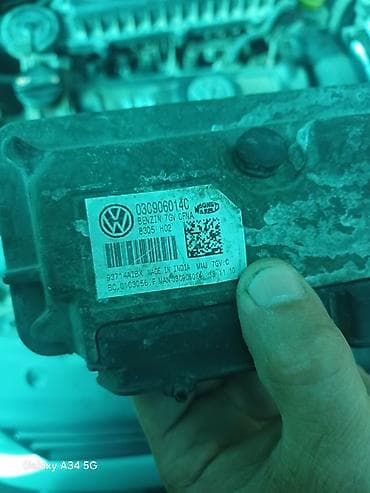 Детали электрики авто: Блок управления двигателем (ЭБУ) Volkswagen Magneti Marelli. - — 1