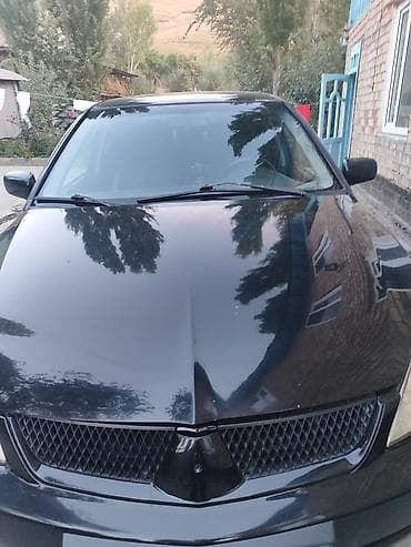 ветровики ниссан: Mitsubishi Lancer: 2007 г., 1.6 л, Автомат, Седан — 3