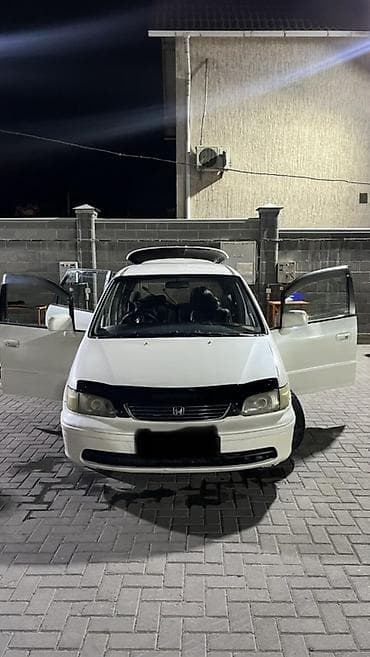 коврики на хонда фит: Honda Odyssey: 1996 г., 2.2 л, Автомат, Бензин, Универсал — 1