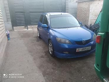 диски на авто: Mazda Demio: 2003 г., Хэтчбэк — 4