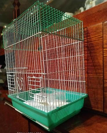 Зоотовары: Клетка среднего размера новая 40/33/26, есть кормушка поилка, 900с — 3