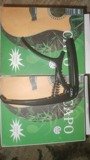 купить гитару в бишкеке бу: Каподастр есть в наличии: металлические и пластиковые . есть доставка — 9