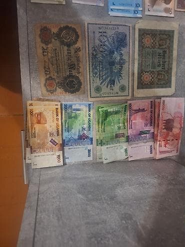 Искусство и коллекционирование: Продаю купюры, первое фото по 100с, второе по 200с, третье немецкие — 3