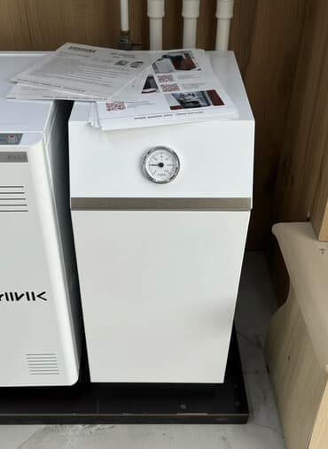 напольные газовые котлы: АСПЕКТ 11.6 Напольный газовый котел Лемакс белого цвета. Оснащен — 1