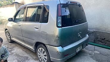 соко мтз: Nissan Cube: 1999 г. — 3