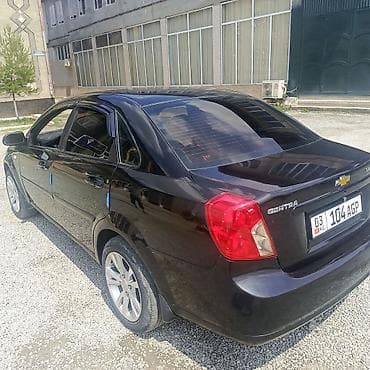 спарк капот: Daewoo Gentra: 2013 г., 1.5 л, Механика, Газ, Седан — 5