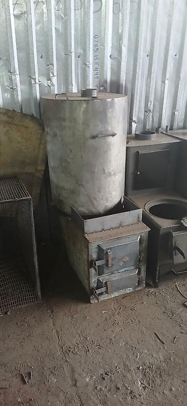 газовые настенные котлы: Твердотопливная печь-водогрей (буржуйка с баком) Описание: - — 5