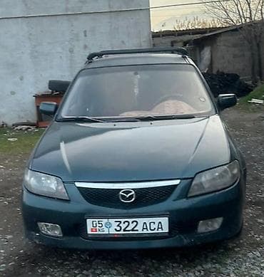 Mazda 323: 2002 г., 1.6 л, Автомат, Бензин, Хэтчбэк