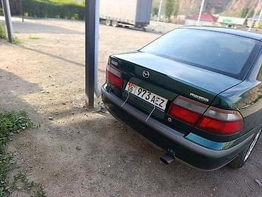 Унаа сатуу: Mazda 626: 1999 г., 1.8 л, Кол менен иштөөчү, Бензин, Седан — 4